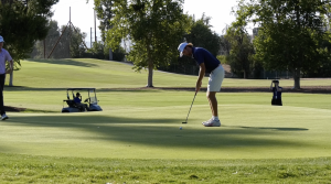 Zachary Polo putting at Valencia Country Club
